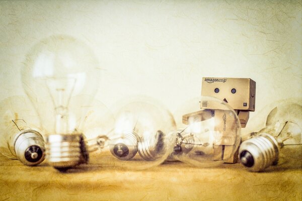 A bunch of light bulbs with a cardboard man