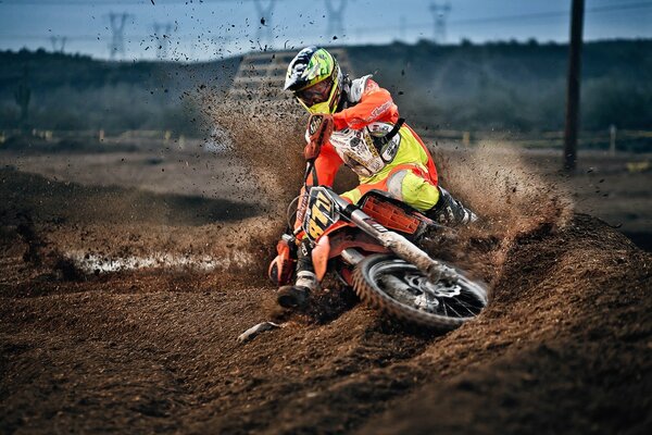 Racing sports in competitions. Photo of a rider on a motorcycle