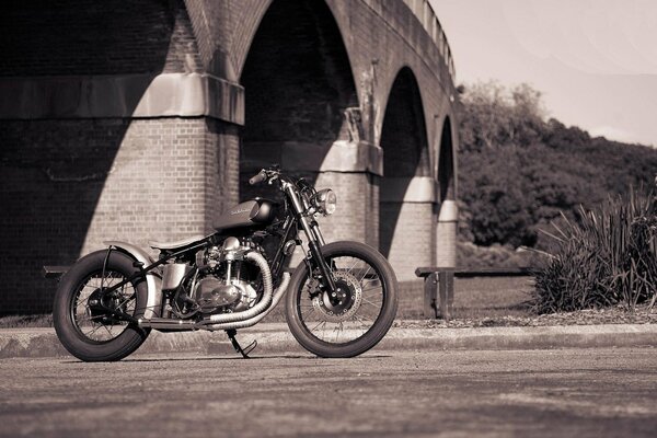 Stylish kawasaki motorcycle under the bridge