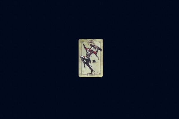 Joker card on a dark background