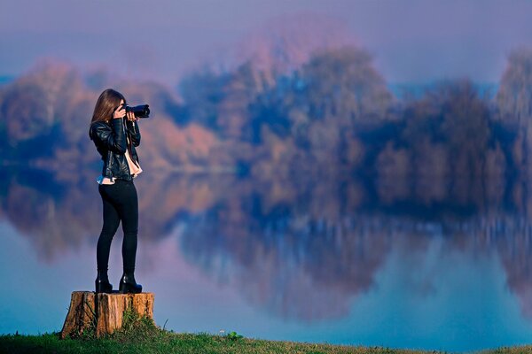 Photographe sur fond de paysage