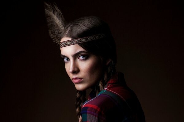 Stylish portrait of a girl from an Indian tribe