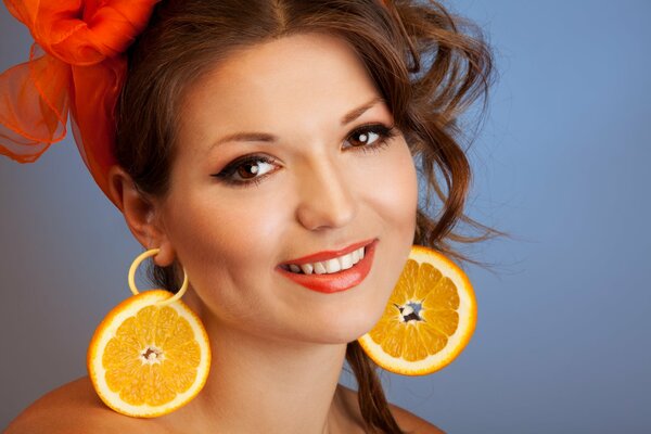 Dark-eyed beauty with orange earrings