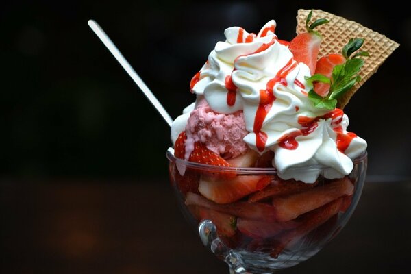 Strawberry and sundae ice cream decorated with waffle