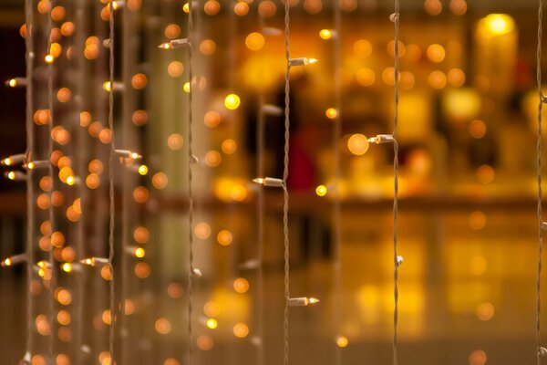 Photo blurring of a light bulb in a garland