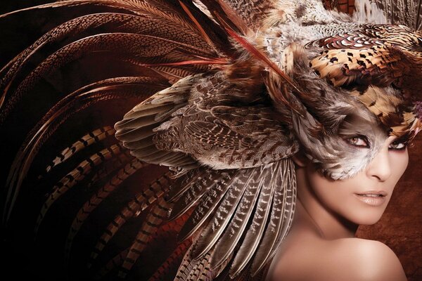 A girl in a mask with long feathers