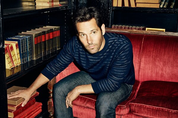 Actor Paul Rudd in a jumper on the couch