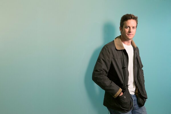 Armie Hammer in jacket and jeans