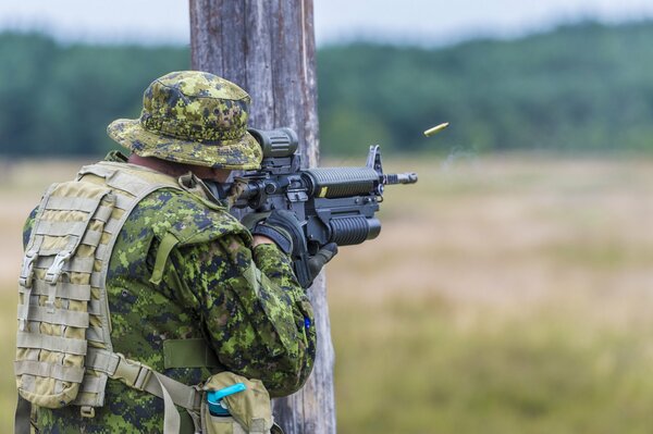 Shot of a military man in camouflage