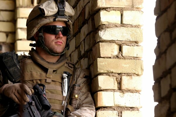 American military in glasses and helmet