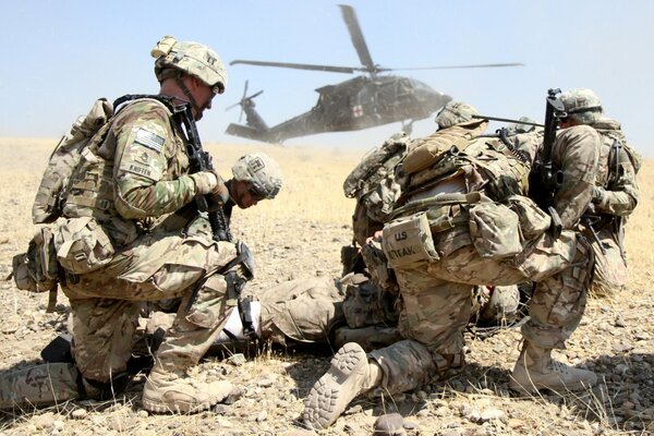 Army soldiers with weapons hiding from the enemy