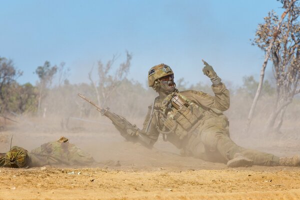 Australian Army soldier with a gun in his hands