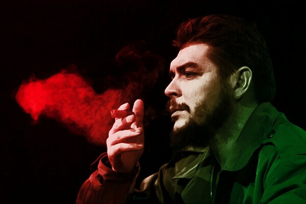 Ernesto Guevara smokes a cigarette and looks into the distance