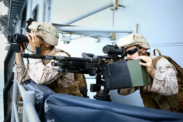 Soldiers with weapons in the army on duty