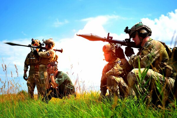 Soldiers in the field on a summer day