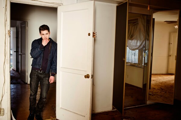 Logan Lerman in the doorway