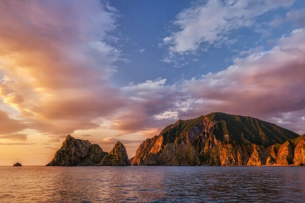 Pacific Ocean comes to life rocks at dawn in Kamchatka