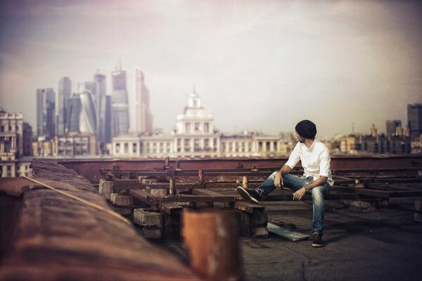 Karen Abrahamyan photo on the roof with a view of the city