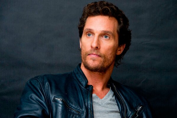 Matthew McConaughey in black jacket and grey T-shirt