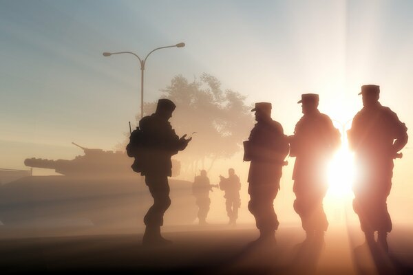 Silhouettes de soldats servant dans l armée à la lumière