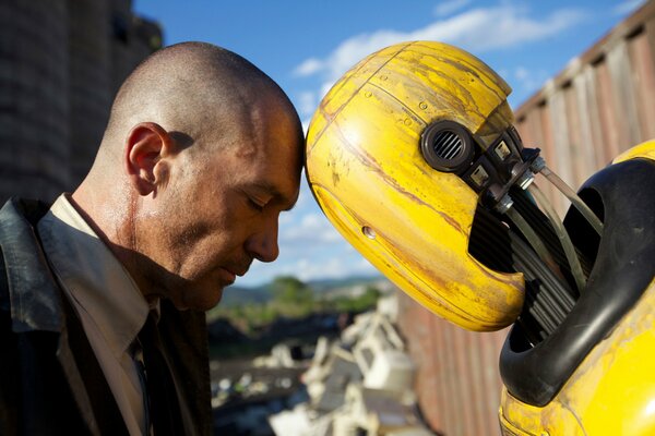 Man and robot head-on