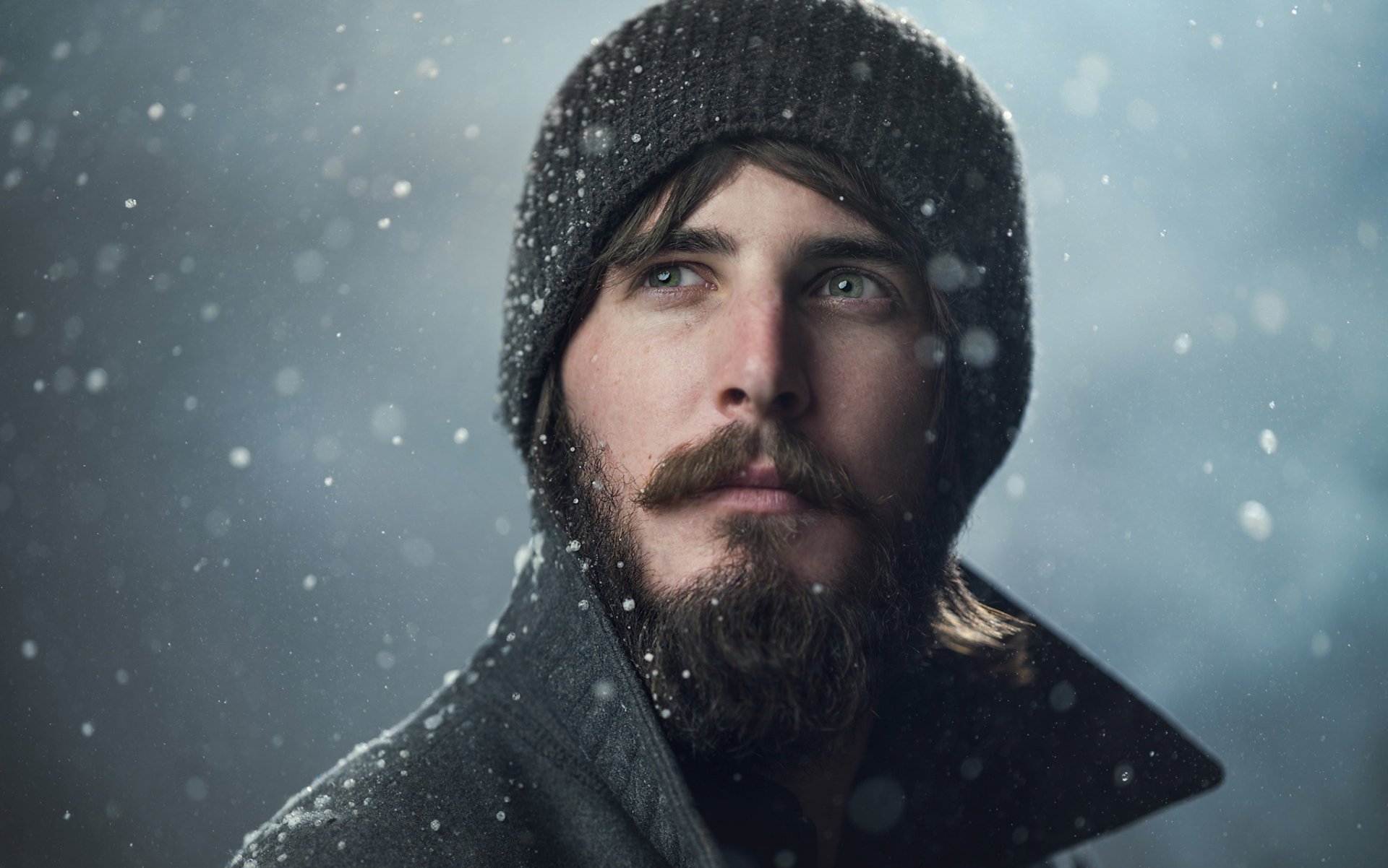 portrait a man hat snow