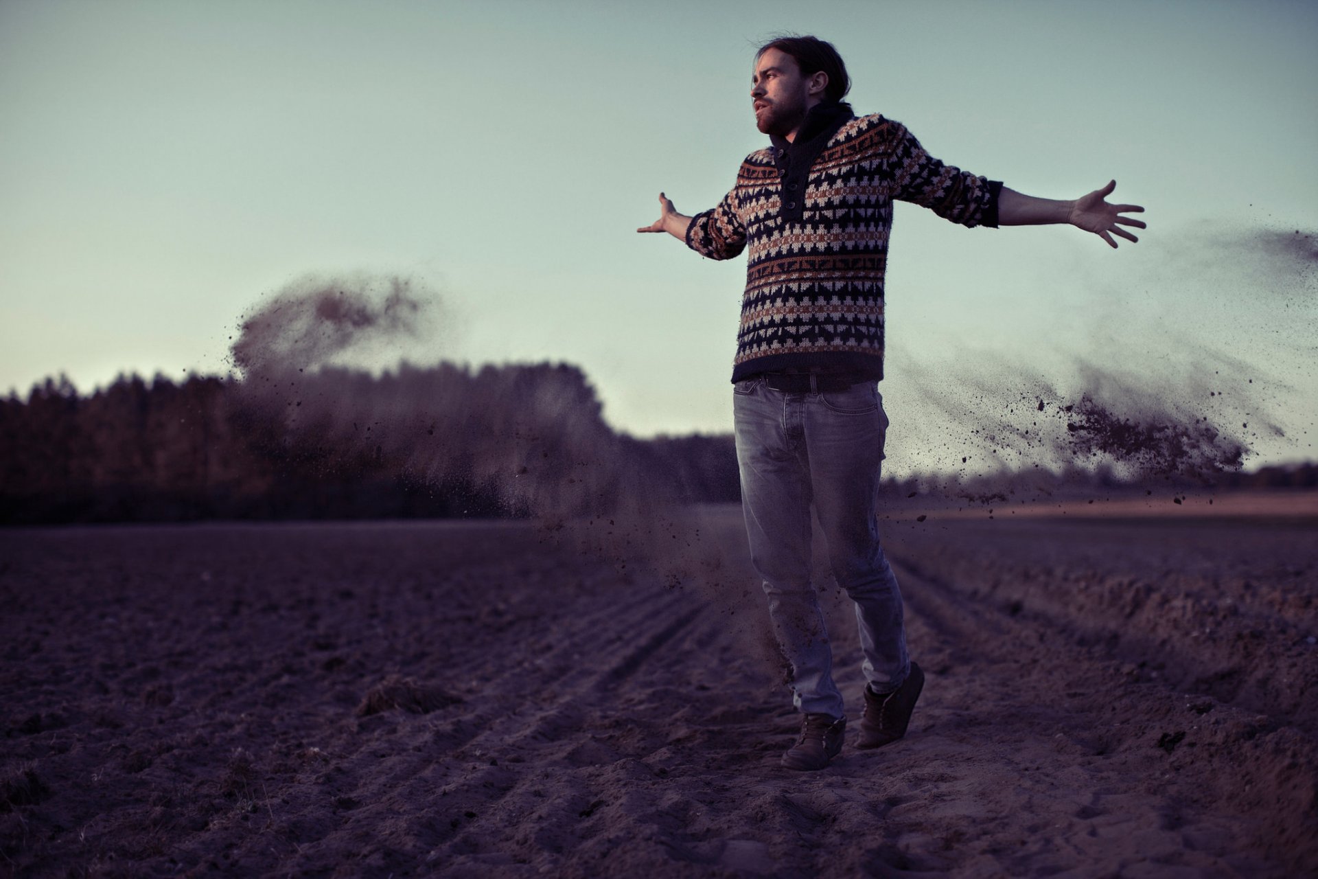 guy arable land dust land sky