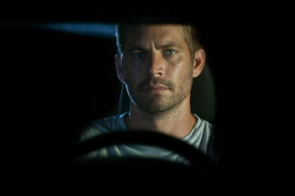 Paul Walker driving a car