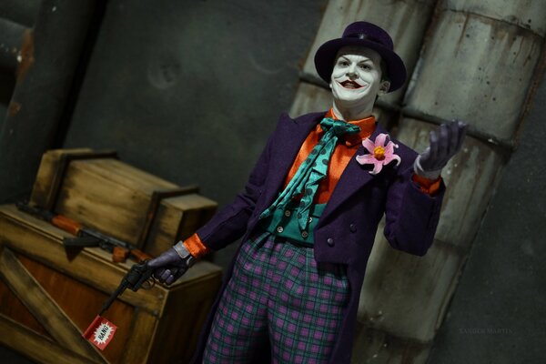 Scary clown in a purple suit with a gun