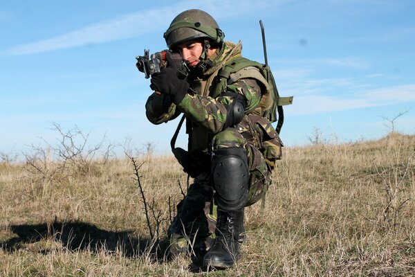 A soldier on duty is focused and serious