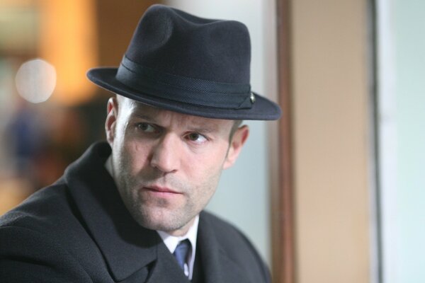 Actor Jason Statham in a hat