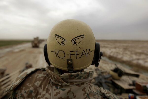 A soldier s helmet with the inscription no fear 