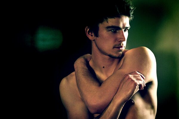 Actor Josh Hartnett looks away