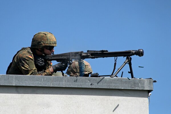 A sniper soldier with a weapon in action