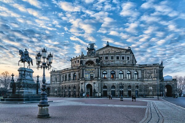 Clouds dissipate over the city square