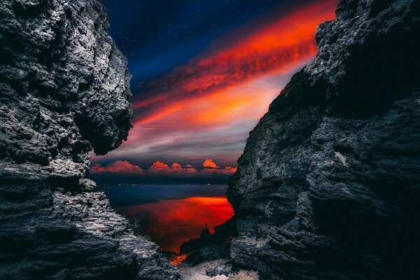 Coastal cliffs against the night sky