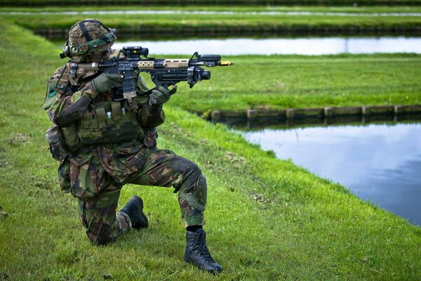 A soldier of the Royal Netherlands Army with a weapon