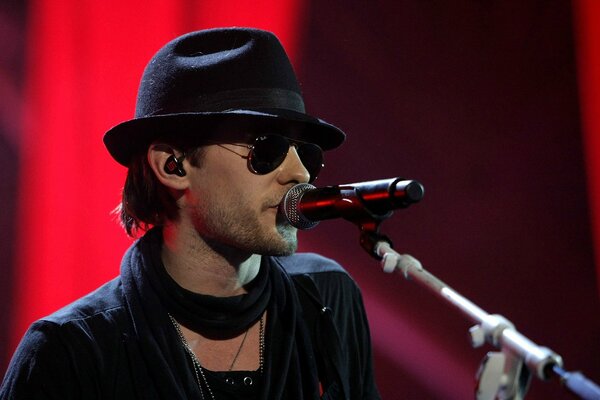 Jared Leto with a microphone in his hat