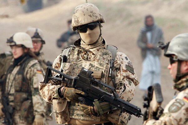 Soldiers with weapons in equipment in Germany