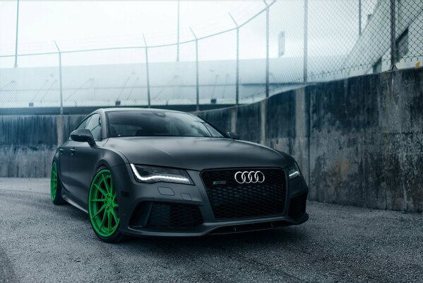 Dark Audi with bright wheels