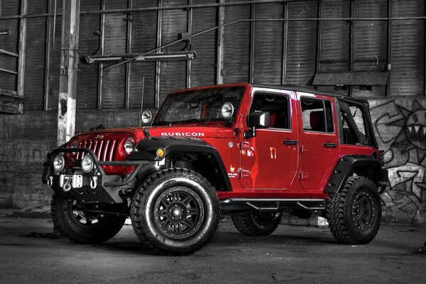 Red jeep on a dark background