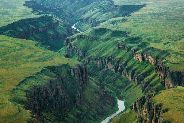 Mountain river between two gorges