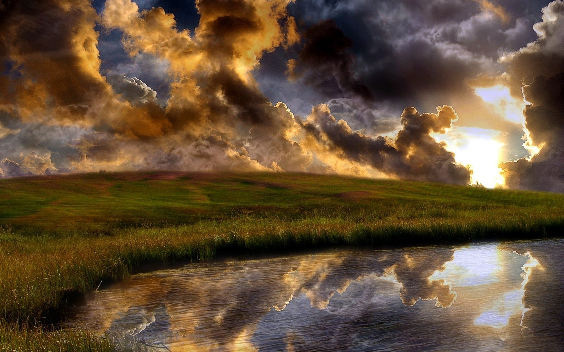 clouds grass reflection the evening