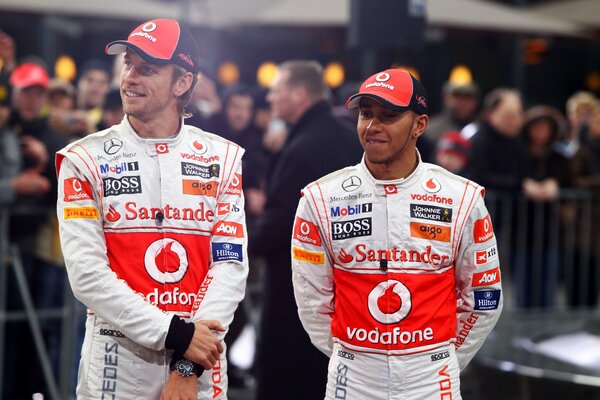 Drivers Alexander Lyons button and Lewis Hamilton