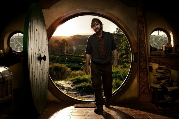 Director Peter Jackson during filming on the threshold near the door
