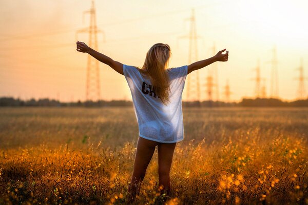 A positive girl in a translucent T-shirt