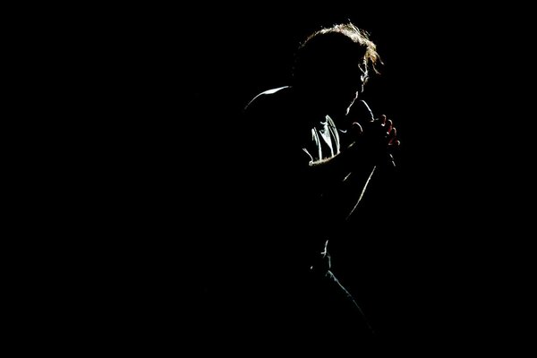 Silhouette of Yuri Shevchuk at the concert