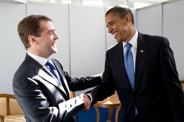 Handshake of two politicians at a meeting