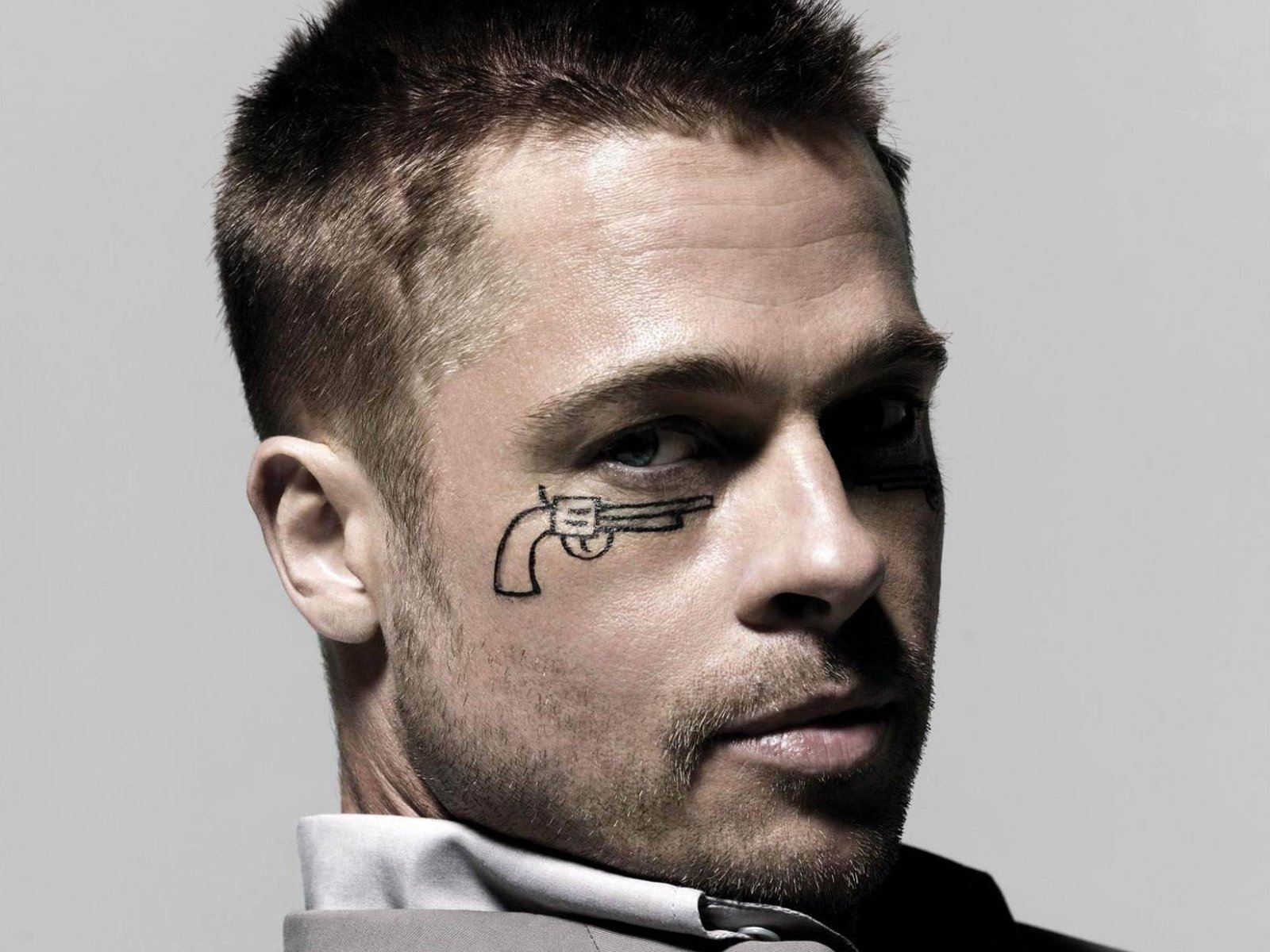 brad pitt actor tattoo on the face good :