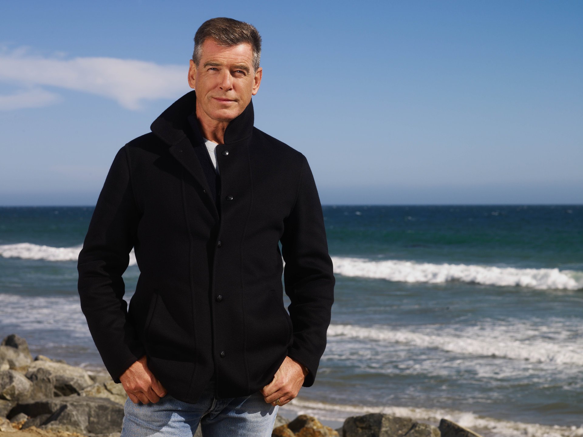 pierce brosnan actor sea views waves stone